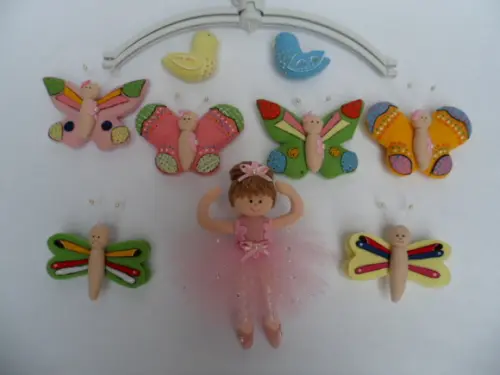 Móbile de berço musical menina.
