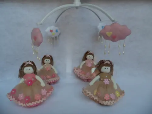 Móbile de berço musical menina.