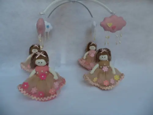 Móbile de berço musical menina.
