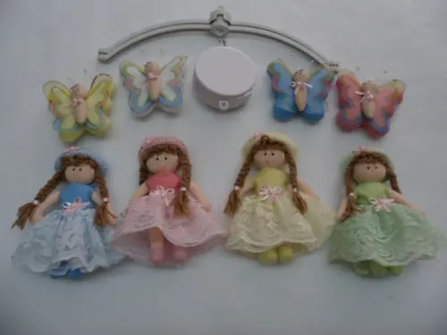 Móbile de berço musical menina.