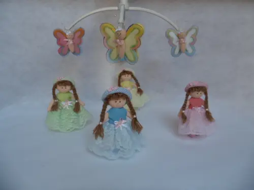 Móbile de berço musical menina.