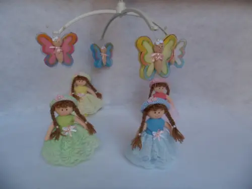 Móbile de berço musical menina.