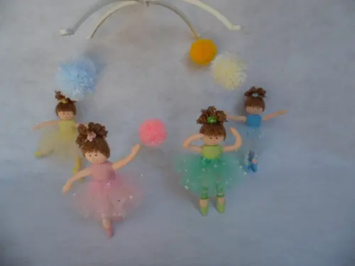 Móbile de berço musical menina.