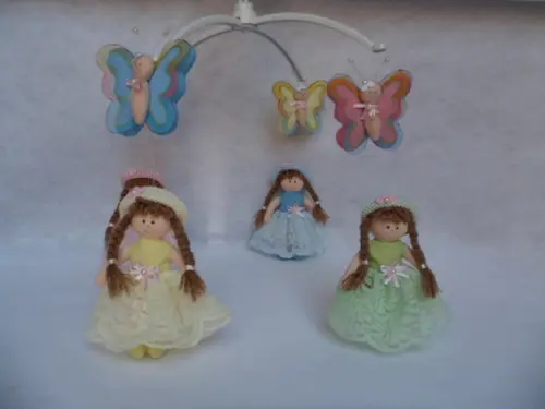 Móbile de berço musical menina.