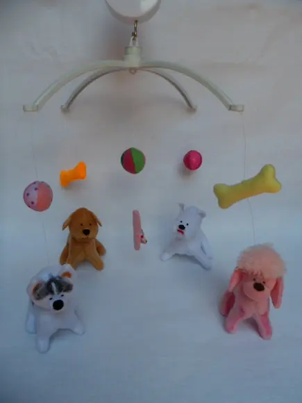 Móbile Musical giratório para berço