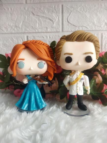 Funko em Biscuit América Singer e Maxon Schreave