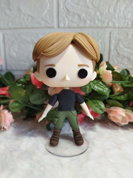 Funko Em Biscuit Peeta De Jogos Vorazes
