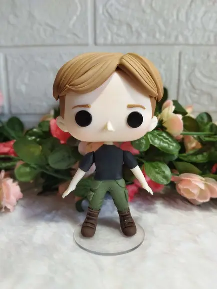Funko Em Biscuit Peeta De Jogos Vorazes