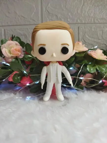 Funko Em Biscuit Peeta De Jogos Vorazes