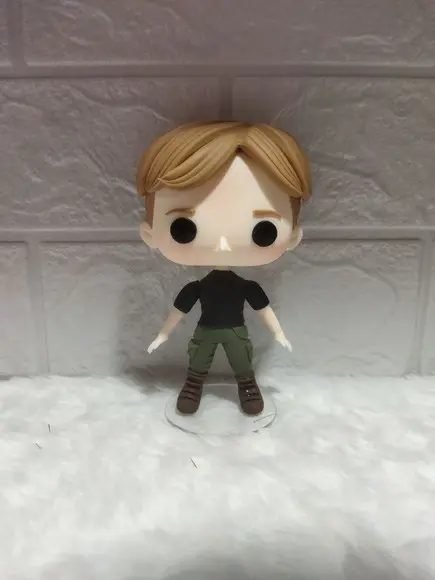 Funko Em Biscuit Peeta De Jogos Vorazes