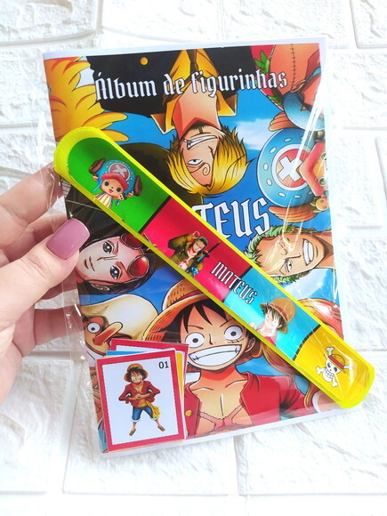 Kit Álbum de Figurinhas + Pulseira One Piece