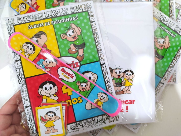 Kit Álbum de Figurinhas+ Pulseira Bate Enrola Mônica