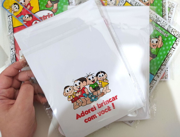 Kit Álbum de Figurinhas+ Pulseira Bate Enrola Mônica