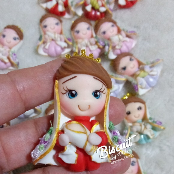Apliques Nossa Senhora de Nazaré em Biscuit