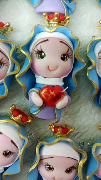 Ímã Nossa Senhora das Dores em Biscuit.