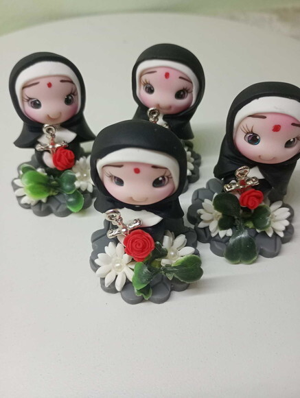 Mini Santa Rita em Biscuit (preço Unitário)