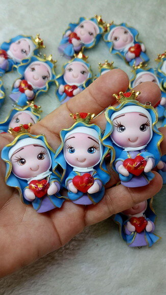 Ímã Nossa Senhora das Dores em Biscuit.
