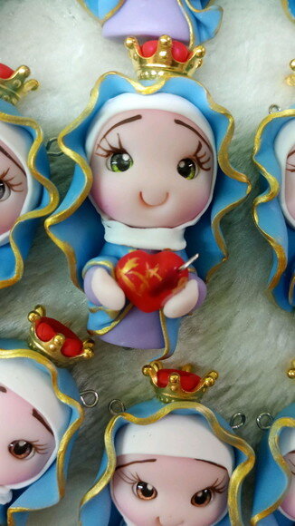 Ímã Nossa Senhora das Dores em Biscuit.