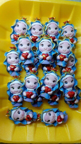 Ímã Nossa Senhora das Dores em Biscuit.