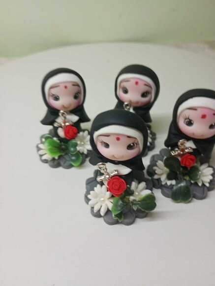 Mini Santa Rita em Biscuit (preço Unitário)