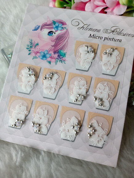 Adesivos de Luxo, Unhas
