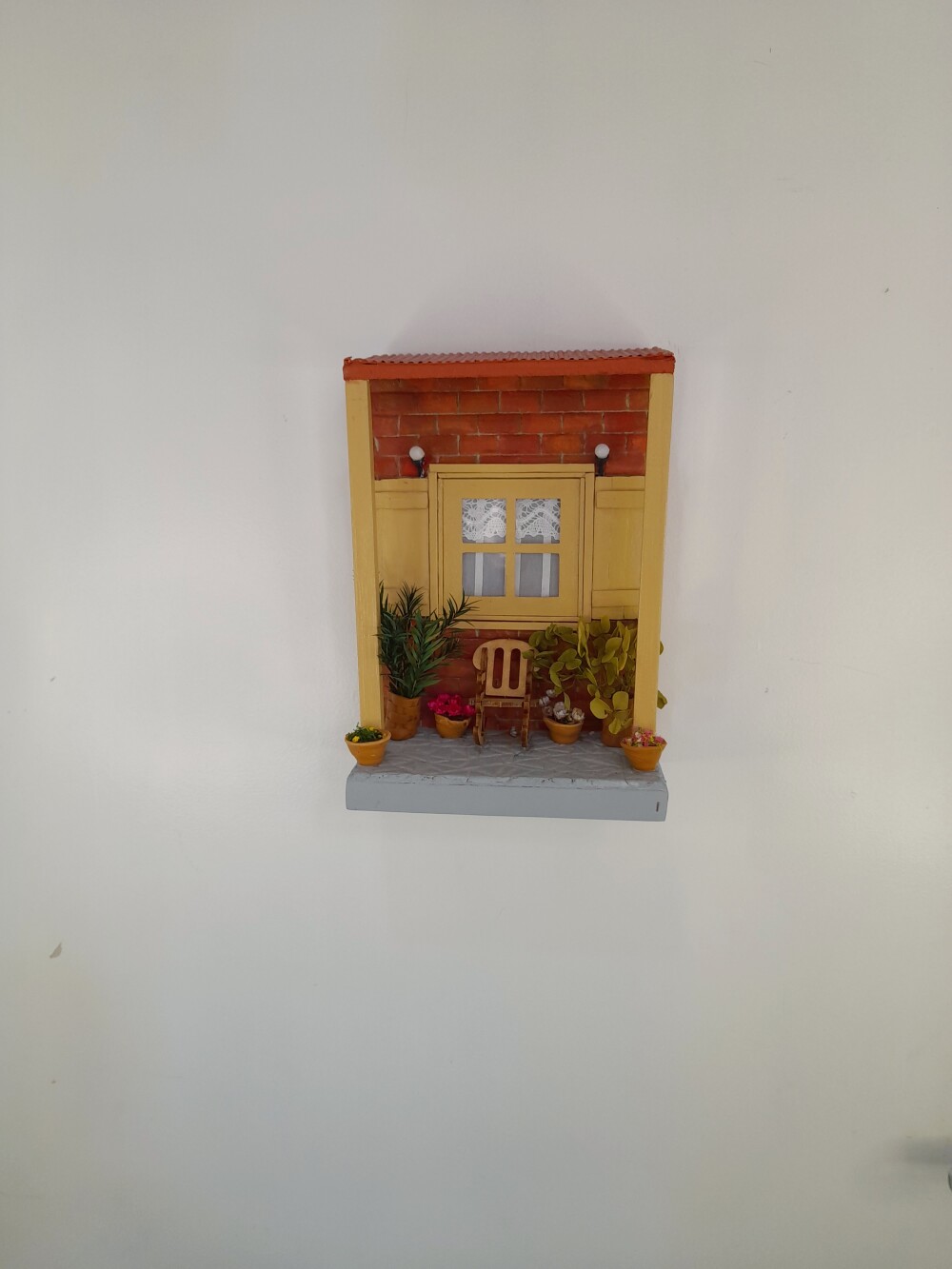 Quadro de mdf imagem de varanda com cadeira de balanço