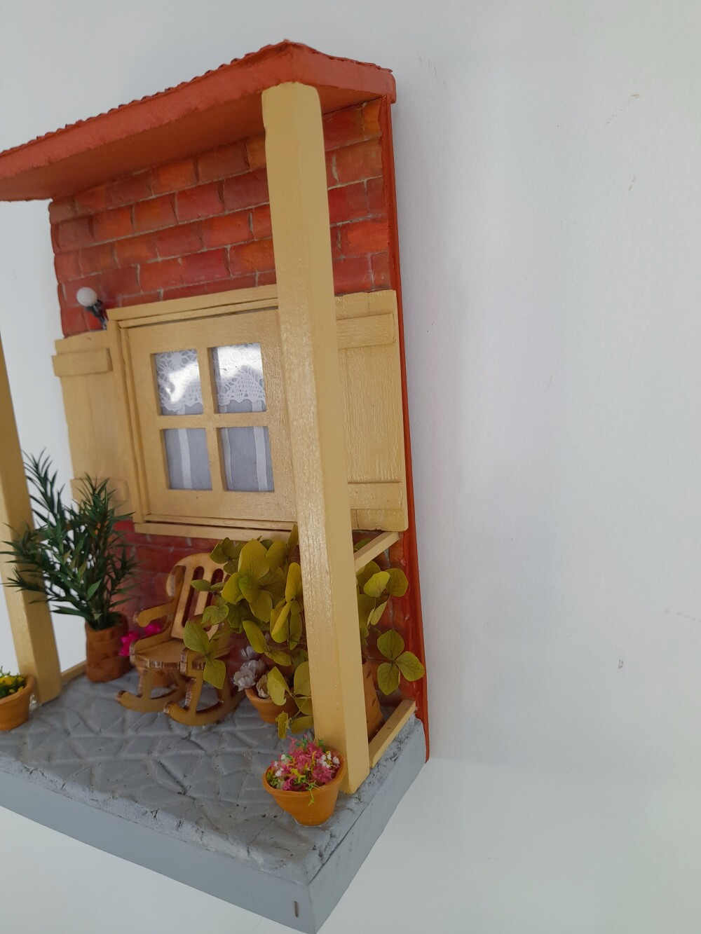 Quadro de mdf imagem de varanda com cadeira de balanço