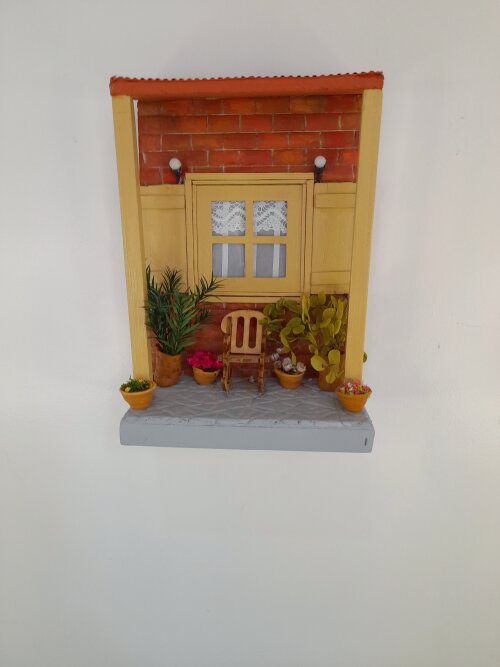 Quadro de mdf imagem de varanda com cadeira de balanço