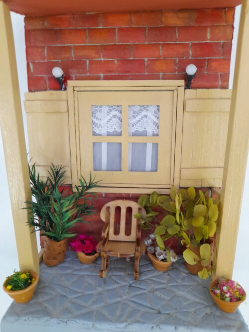 Quadro de mdf imagem de varanda com cadeira de balanço