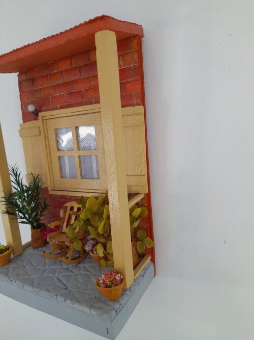 Quadro de mdf imagem de varanda com cadeira de balanço