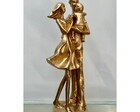 Escultura Pais com filho no colo