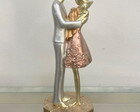 Escultura Mãe, Pai e Bebê