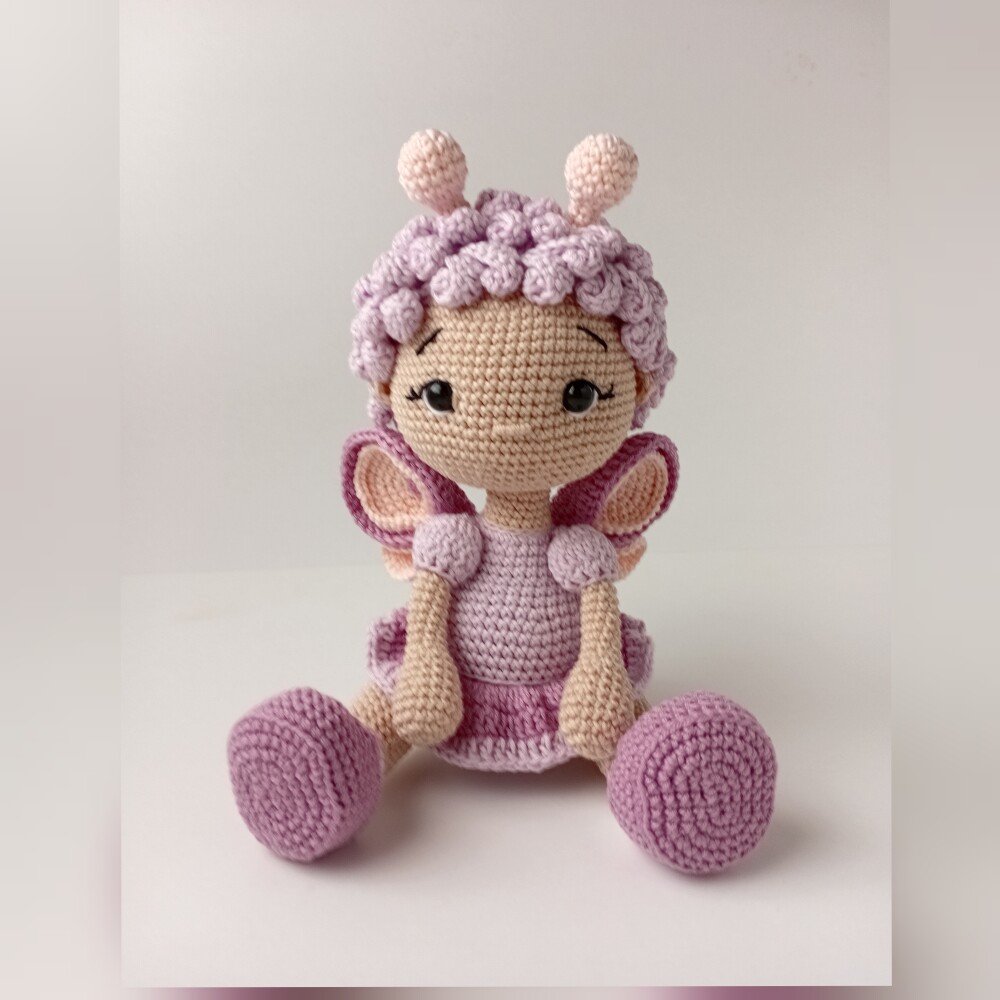 Lizzie, a boneca borboleta
