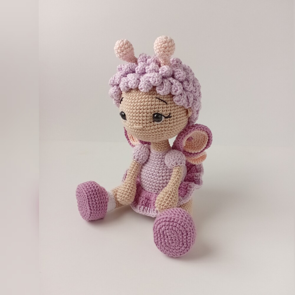 Lizzie, a boneca borboleta