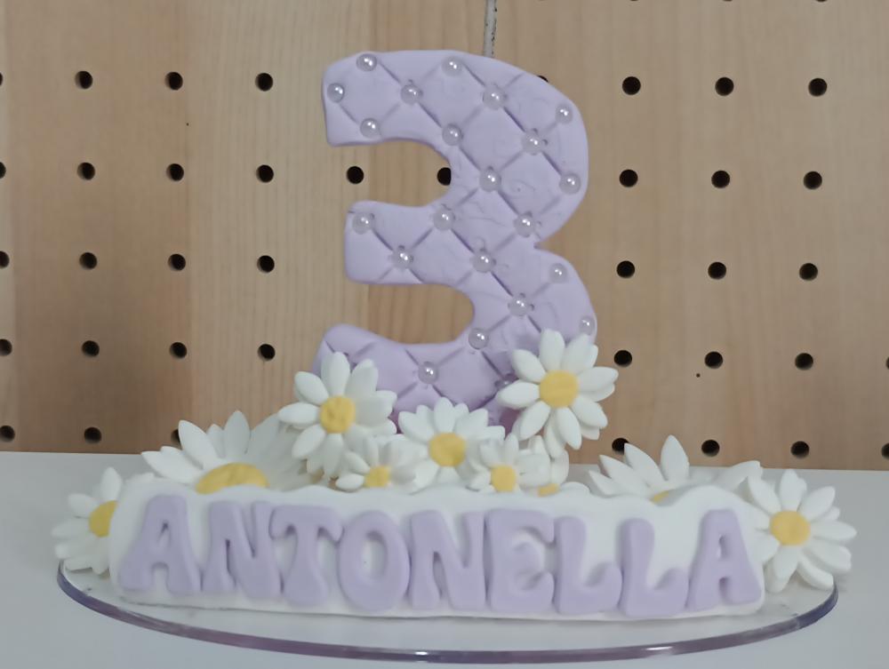 Vela personalizada margaridas de biscuit