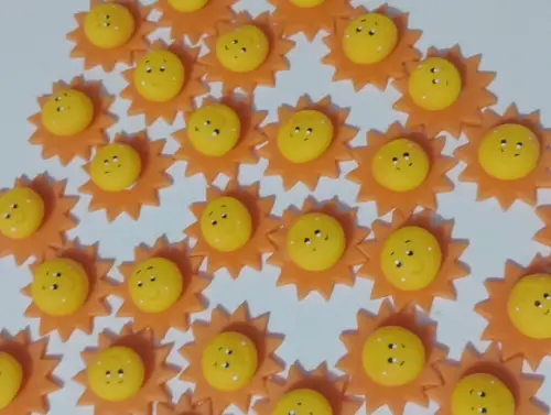 Aplique Solzinho de Biscuit com Dez Peças