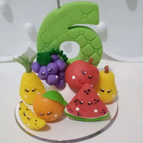 Vela Frutinhas com Carinha de Biscuit