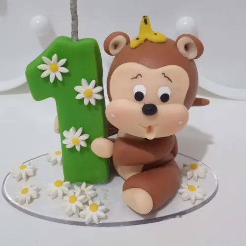 Vela Safari Macaco com Margaridas de Biscuit
