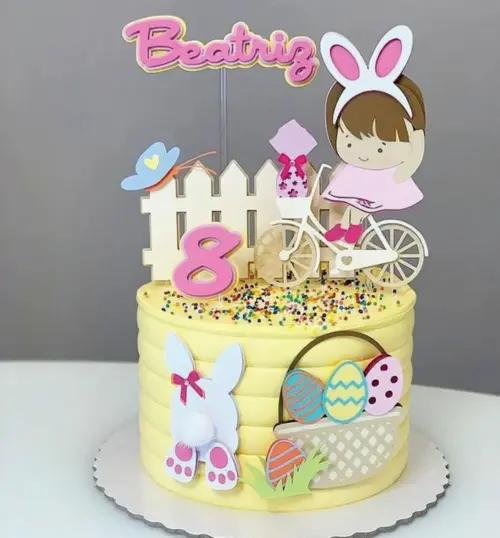 Arquivo de corte topo de bolo menina de bicicleta páscoa