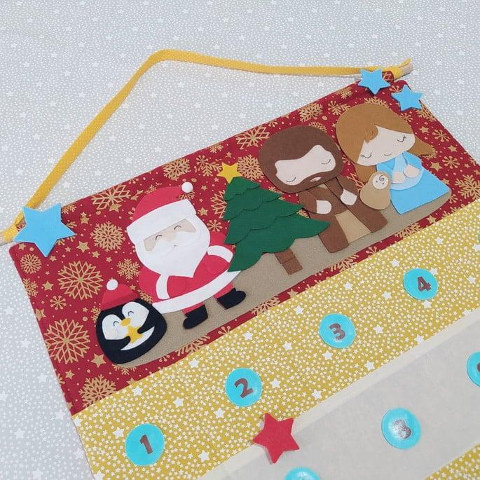 Calendário de Natal ou Advento G - Sagrada Família e Noel