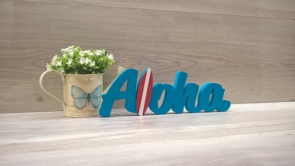 Aloha com prancha de Surf