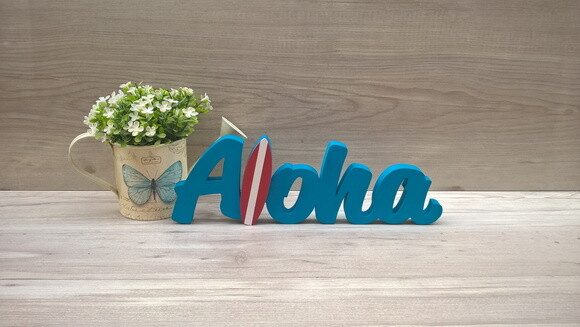 Aloha com prancha de Surf