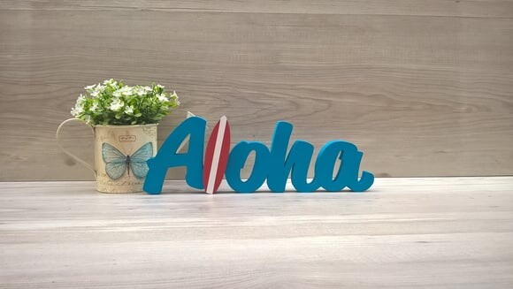 Aloha com prancha de Surf