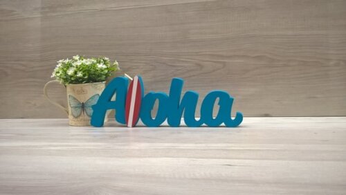 Aloha com prancha de Surf