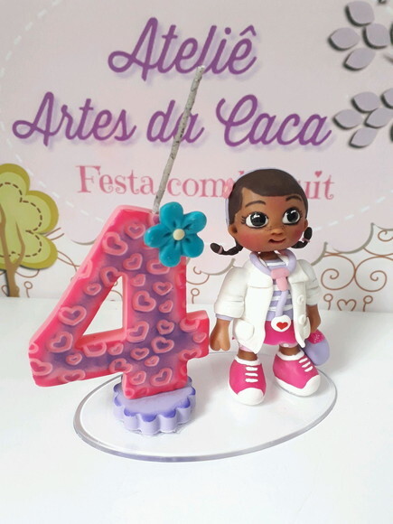 Topo de bolo em biscuit Dr. Brinquedos.