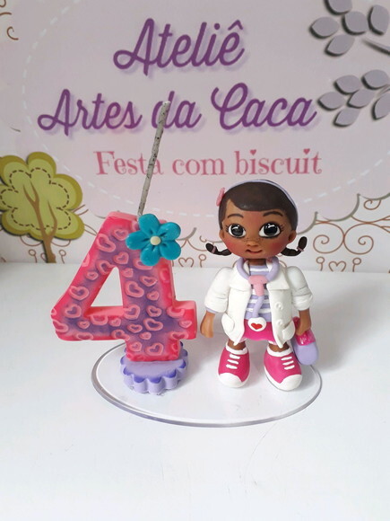 Topo de bolo em biscuit Dr. Brinquedos.