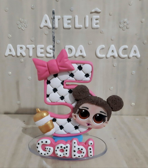 Vela bonequinha surpresa