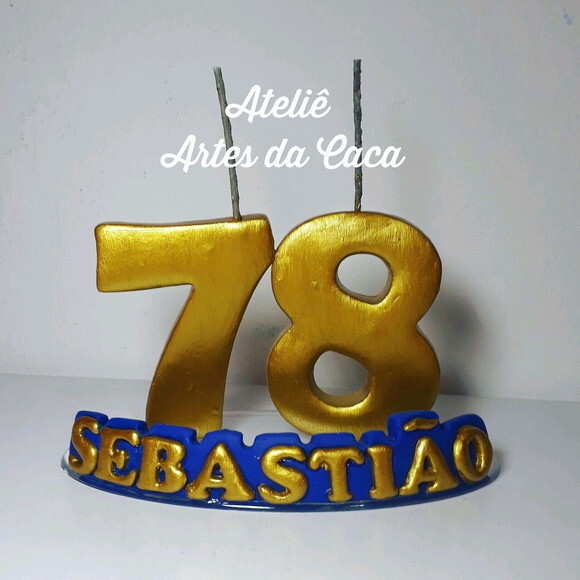 Vela dourada com nome