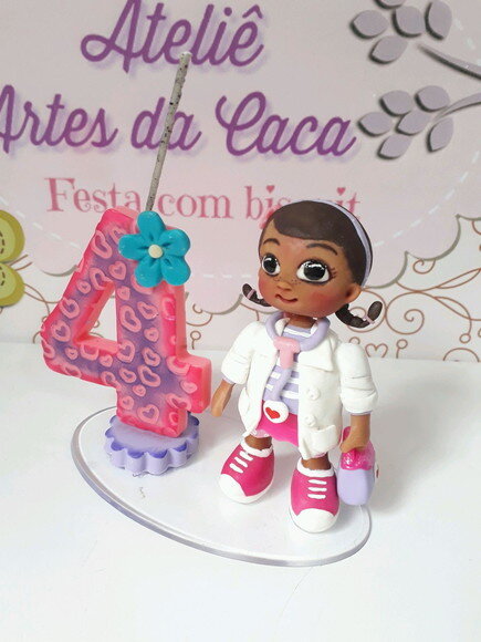 Topo de bolo em biscuit Dr. Brinquedos.