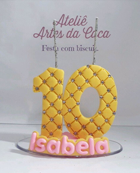 Vela com nome amarela e rosa